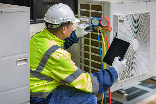 Professional Hvac technician working in Rougemont, NC